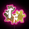 vibrant rgb neon sign displaying "over the hedge" in colorful pink tones