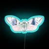 A pink ghost cicada in a vibrant watercolor illustration with an RGB neon sign.