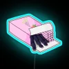 pink-toe-tarantula-hiding-as-pocky-sticks-rgb-neon-sign-blue