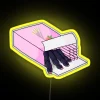 pink-toe-tarantula-hiding-as-pocky-sticks-rgb-neon-sign-yellow