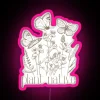 A vibrant pink neon sign displaying 'plant native'.