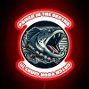 rgb neon sign glowing 'catch your giant' – power in the depths