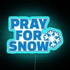 Neon sign saying 'pray for snow' in RGB neon blue.