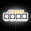 A programmer's routine RGB neon sign highlighting developer workflow and productivity.
