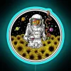 Astronaut standing among vibrant sunflowers with psychedelic neon blue and RGB lighting effects.
