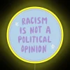 Racism is not a political opinion neon sign with vibrant RGB lighting.