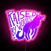 A raised RGB neon sign with vibrant pink lighting.