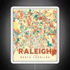 A colorful mosaic map of Raleigh with RGB neon sign effects.