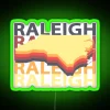vintage raleigh nc souvenir neon sign featuring north carolina