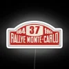 Neon sign for 1964 Rallye Monte Carlo - vintage racing event with RGB lighting, white background.