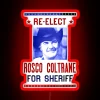 Neon sign promoting Sheriff Roscoe's re-election campaign.