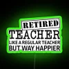 RGB neon sign displaying "Retired Teacher" in green