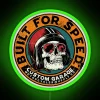 retro motorcycle built for speed with RGB neon sign and vibrant green lighting