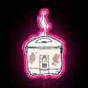 Rice cooker neon sign with hearts design in pink.