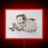 Neon sign featuring Richard and a metal boar with RGB lighting in red.