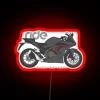 honda cbr500r motorcycle with black and red paint featuring rgb neon sign