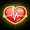 rgb neon heart sign with bright yellow background
