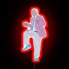 roy williams dancing under vibrant rgb neon sign with bold red lighting