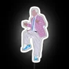 roy williams dancing with rgb neon sign