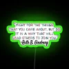 Ruth Bader Ginsburg inspiring quote in vibrant RGB neon sign with green tones.