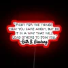 ruth-bader-ginsburg-quote-neon-sign-rgb-colors-red-background.webp