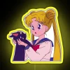 sailor moon and luna neon sign with vibrant rgb lighting in yellow