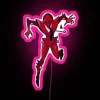 The SEO-friendly alt text for the image is: scarab neon sign with rgb lighting - pink, vibrant".