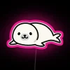 Vibrant RGB neon sign displaying a pink seal.