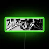 Neon sign displaying SERIOUS YUTA in green RGB lighting.