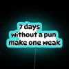 Seven days without a pun makes one weak - neon RGB blue sign.