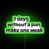 Seven days without a pun makes one weak - Neon Sign with Green RGB Lighting.