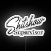 Neon sign showing 'Shit Show Supervisor' with funny mom, boss, manager, and teacher roles in vibrant RGB.