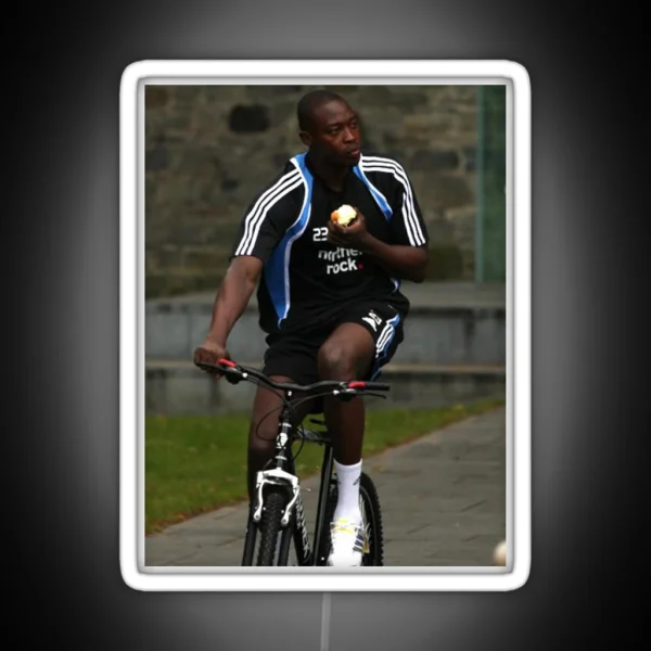 Shola Eating An Apple On A Bike Led RGB Neon Sign