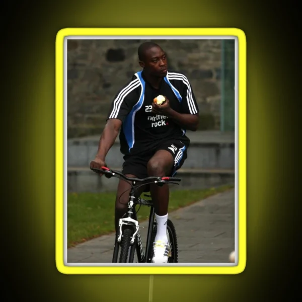 Shola Eating An Apple On A Bike Led RGB Neon Sign