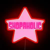 rgb neon sign displaying a star design in vibrant red - ideal for shopaholic themes.