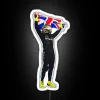 Sir Lewis Hamilton celebrating his win at the 2024 British Grand Prix in Silverstone with an RGB neon sign.