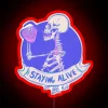 Skeletal figure enjoying coffee in a vibrant, glowing neon sign.