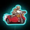 Neon illuminated skeleton riding a motorcycle with sidecar in a futuristic blue glow.