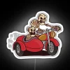 RGB neon sign featuring a skeleton riding a motorcycle with sidecar, illuminated in bright white colors.