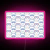 Pink neon ski goggles with colorful snowflake pattern against RGB background