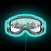 Ski goggles with neon blue accents on a colorful background