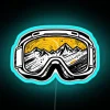Neon ski goggles and snowboard accessories on a colorful sign in a snowy environment.