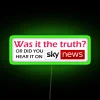 rgb neon sign with sky news media in vibrant green lighting