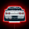 Nissan Skyline GTR R32 in neon light on city skyline