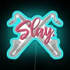 A colorful, neon-lit sign featuring a bass clarinet in bold, rainbow hues.