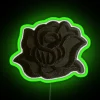 Small black rose with LED neon lights in green color
