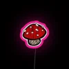 Small, bright red mushroom-inspired neon sign with pink undertones.
