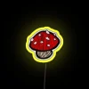Neon sign featuring a small red mushroom in RGB colors against a yellow background.