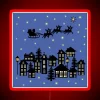 Small town Christmas scene with neon lights on a dusky blue evening