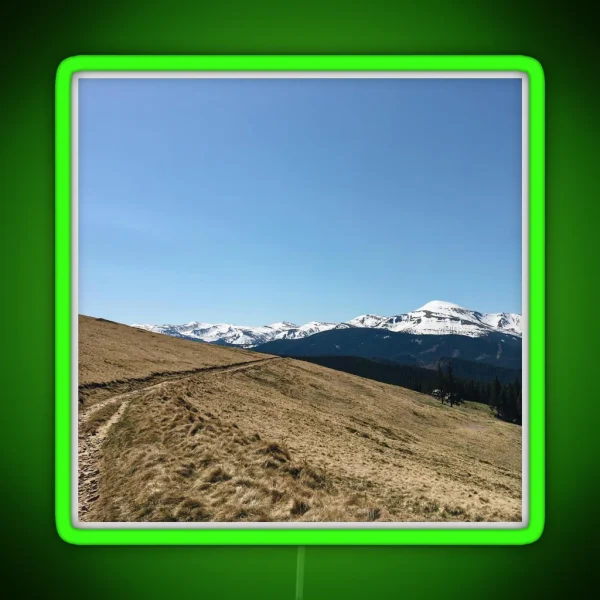 Snowy Mountain Peaks And Forest Landscape On The RGB Neon Sign